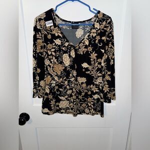 Elegant Black and Cream Blouse with Subtle Floral Design